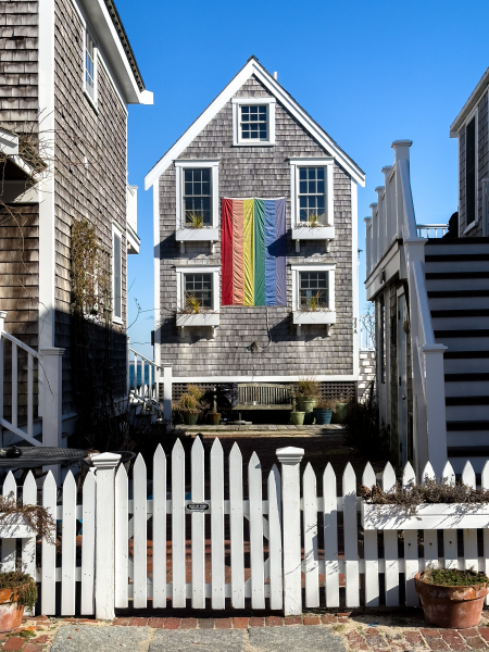 141-Provincetown-77A-Commercial-Street-With-Pride-Flag