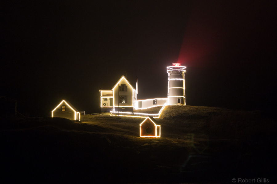 065-Cape-Neddick-Nubble-Lighthouse-Lit-Up-On-Foggy-Night