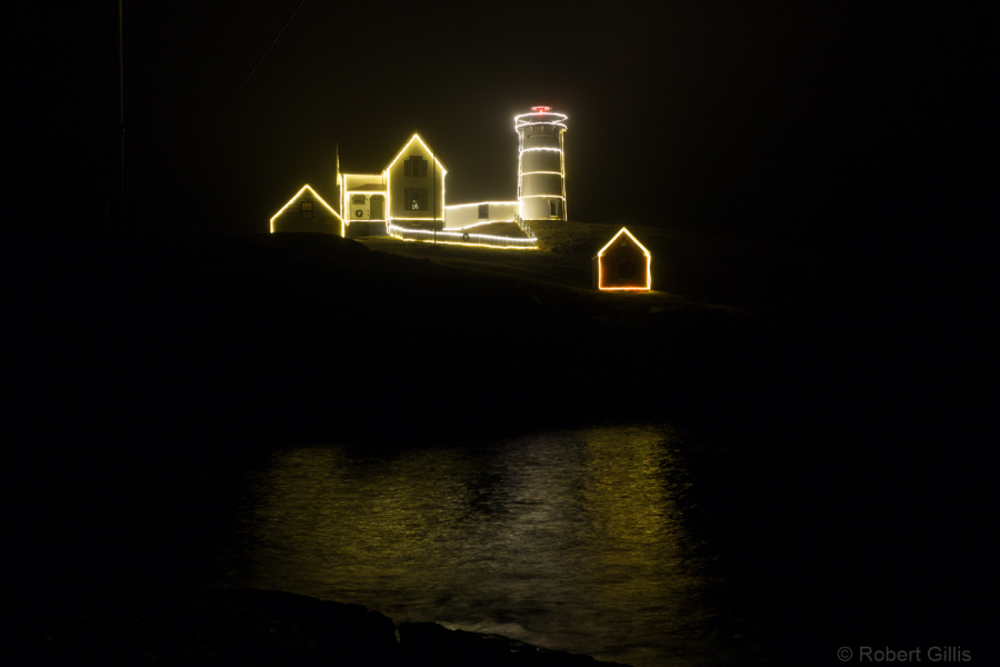 070-Cape-Neddick-Nubble-Lighthouse-Lit-Up-On-Foggy-Night